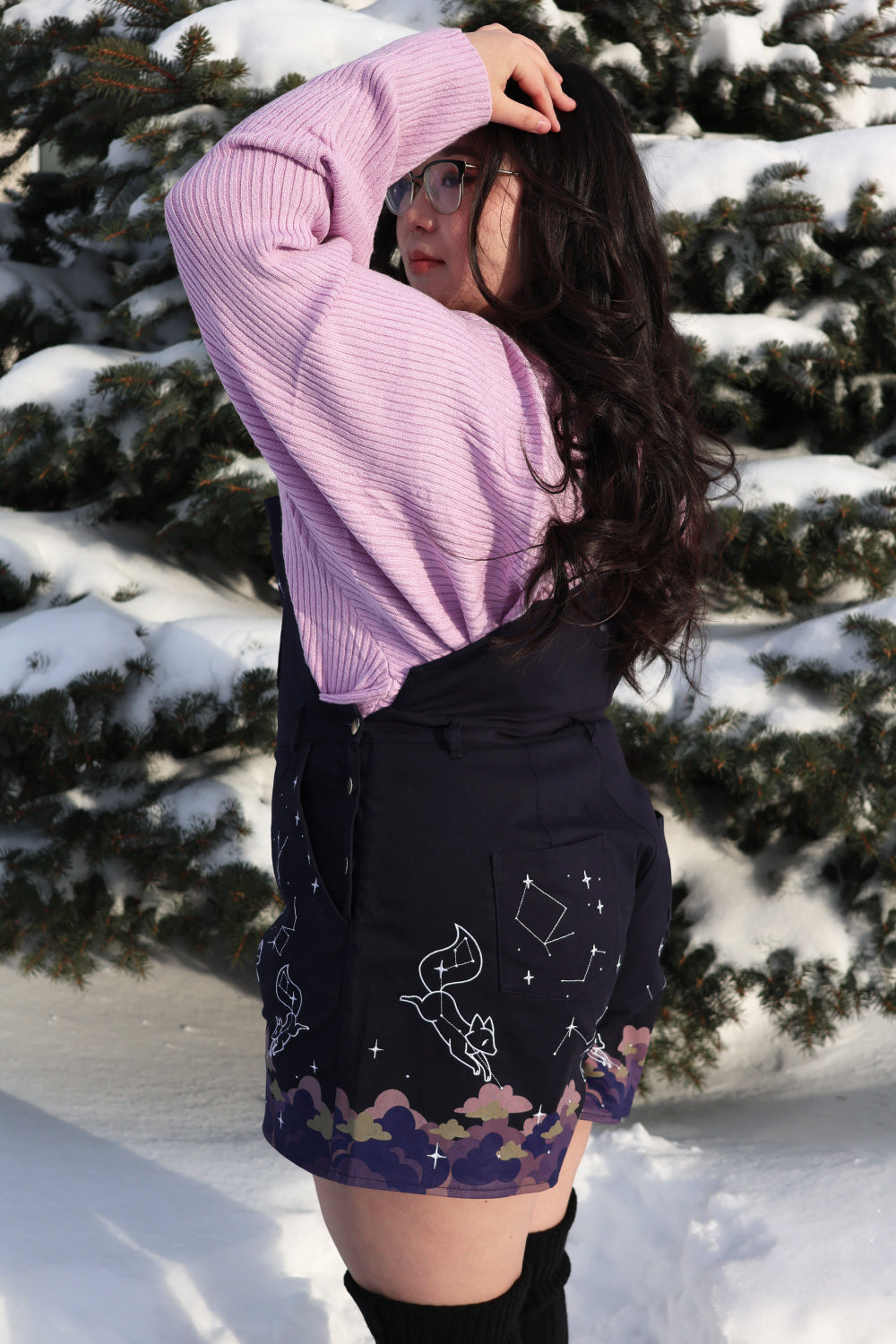 Side view of Astral Dream celestial overalls with constellation artwork