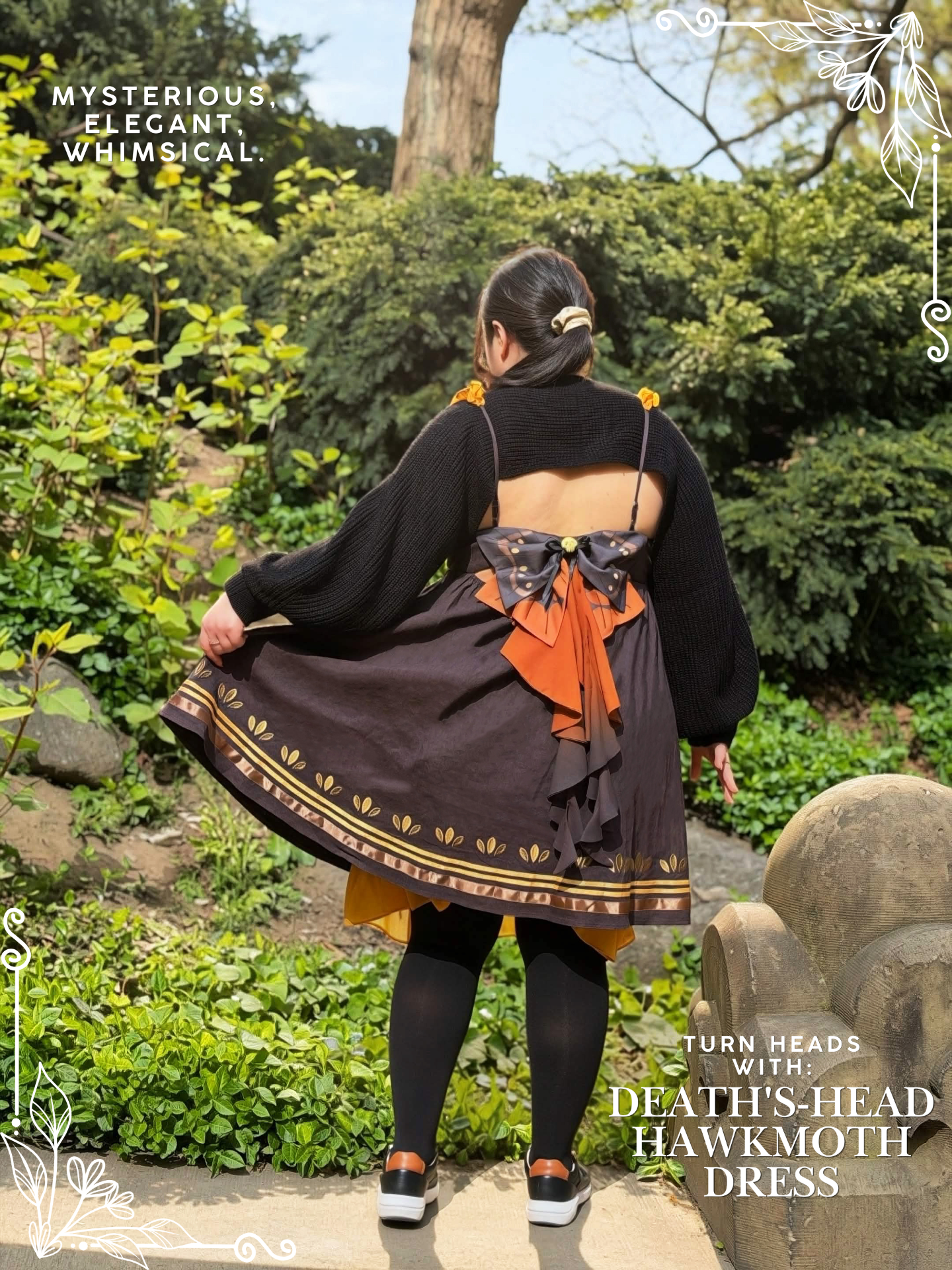 Whimsical brown and orange moth-inspired dress photographed in a garden setting.