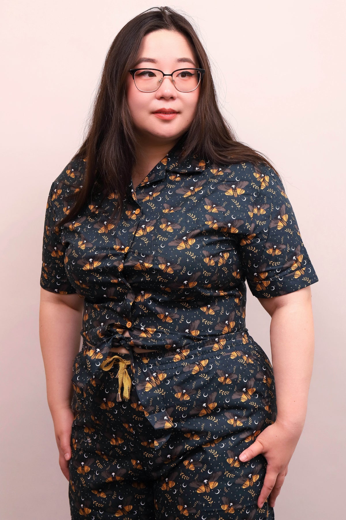 Dark cotton button-up shirt featuring detailed death’s head moth print and botanical inspired alternative fashion design