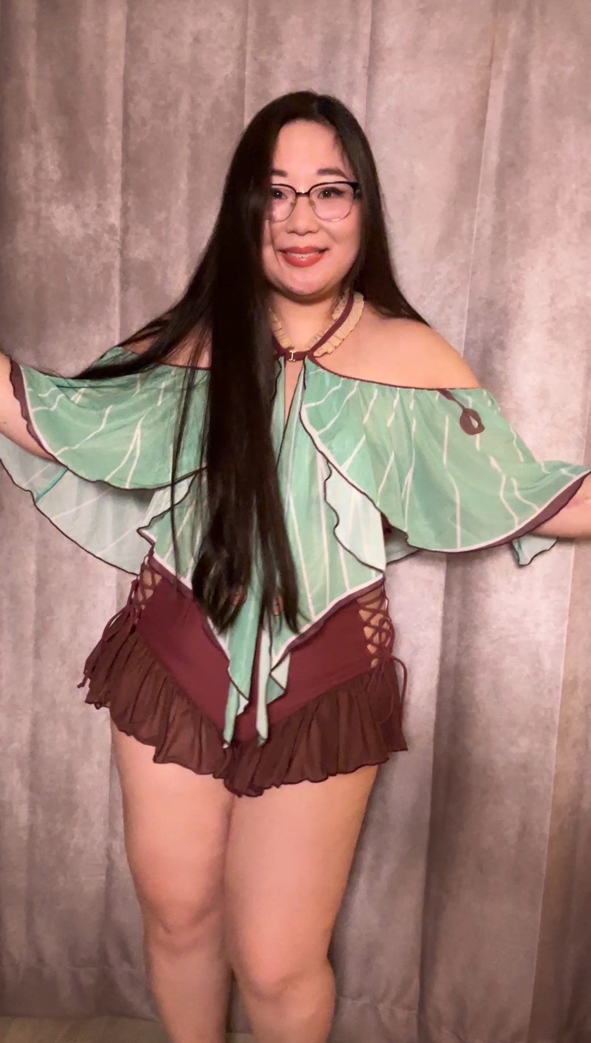 Prototype sample of the Luna Moth Swimsuit Set featuring a brown ruffle swimsuit and green luna moth wing-inspired cover-up with fairycore details.